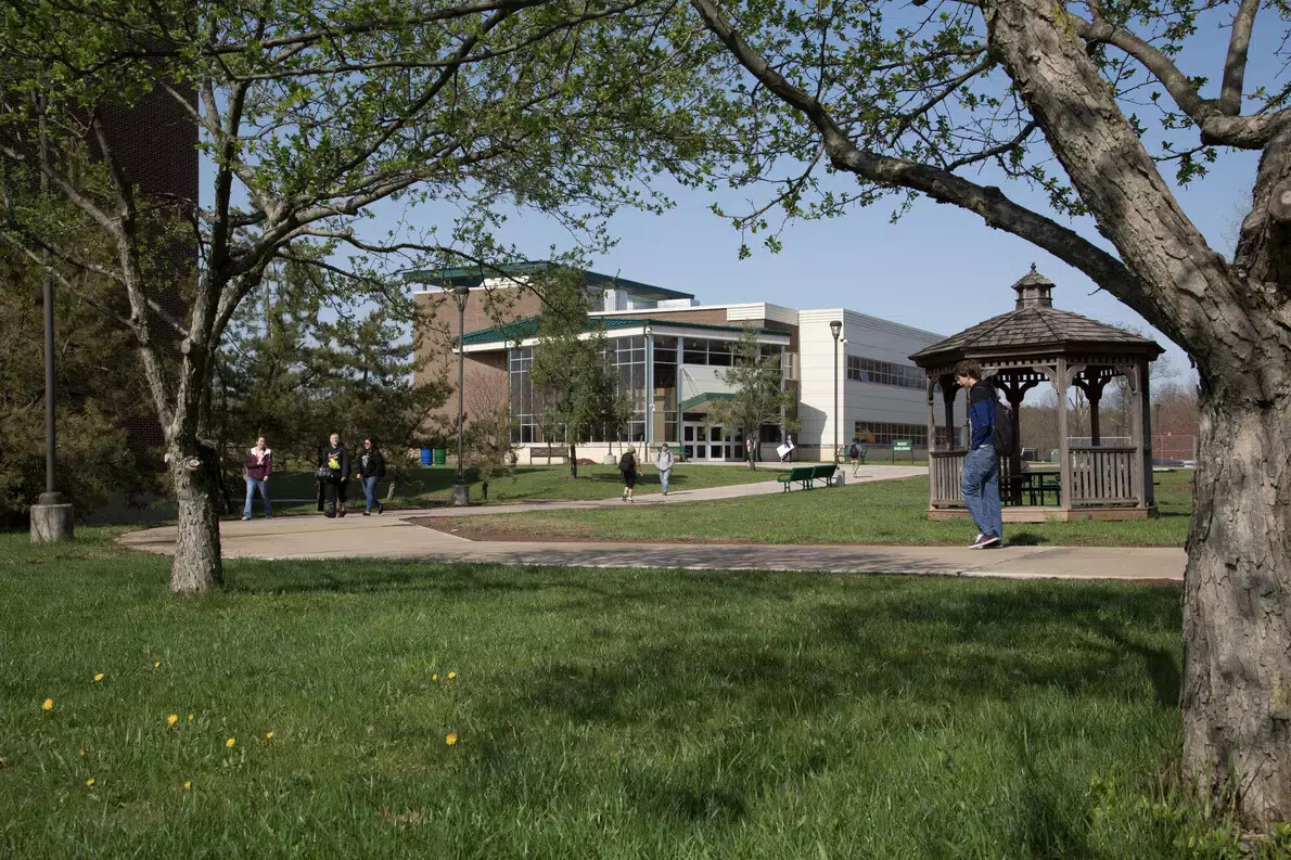 campus with gazebo and west building in distance