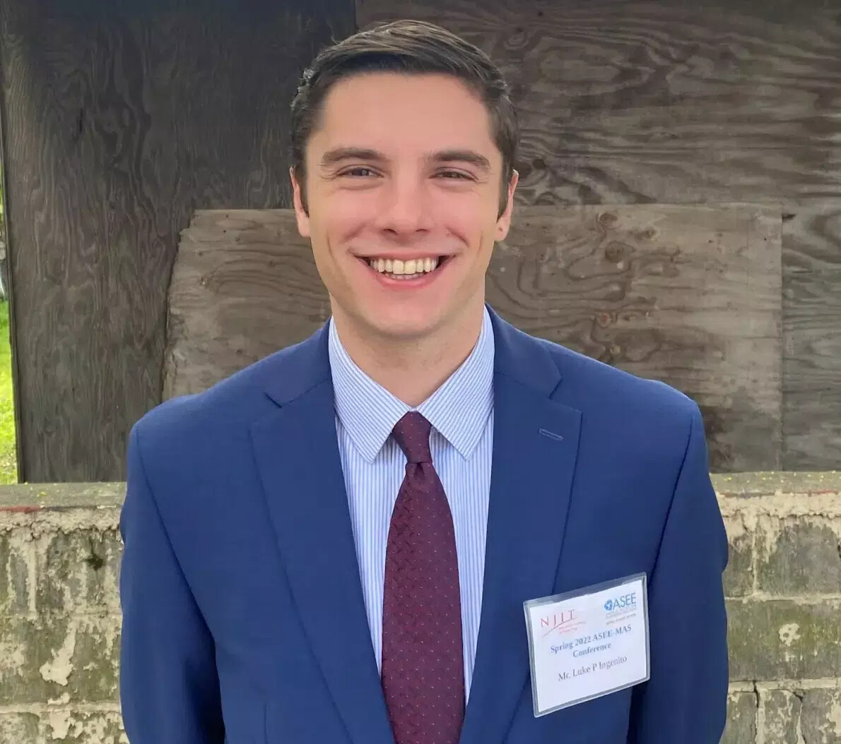 luke ingenito in dark red tie