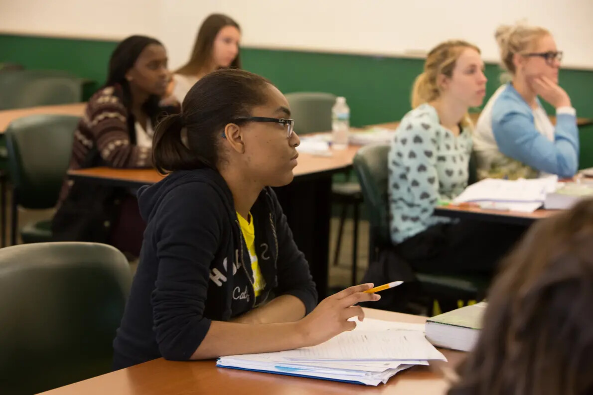 5 female students in classroom