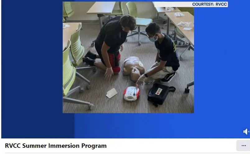 news 12 image of students doing cpr on manequin torso