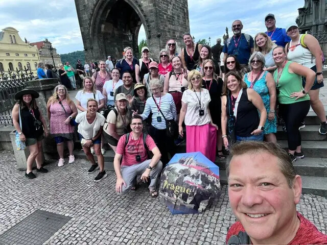 group of teachers and rock marked prague