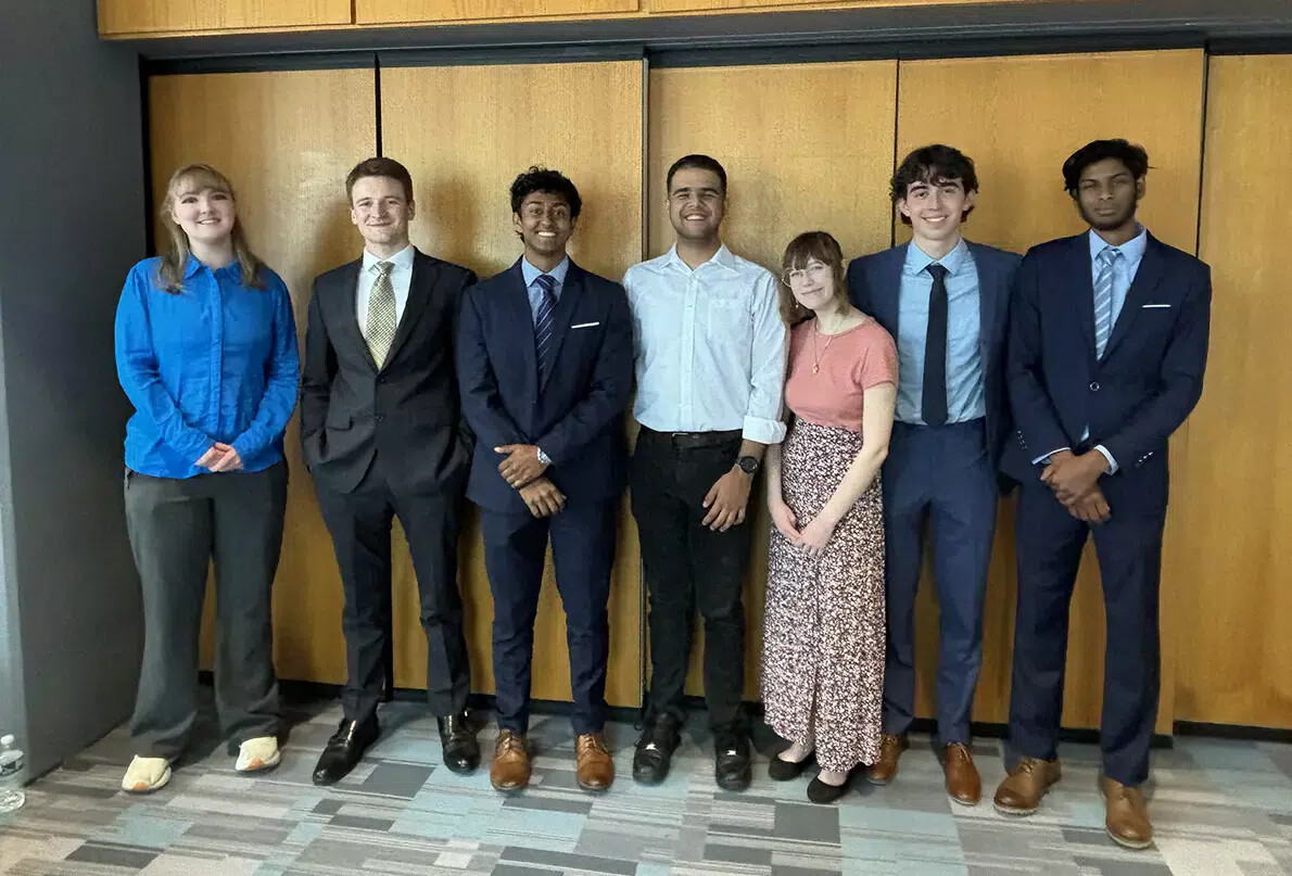 7 honors college students in atrium