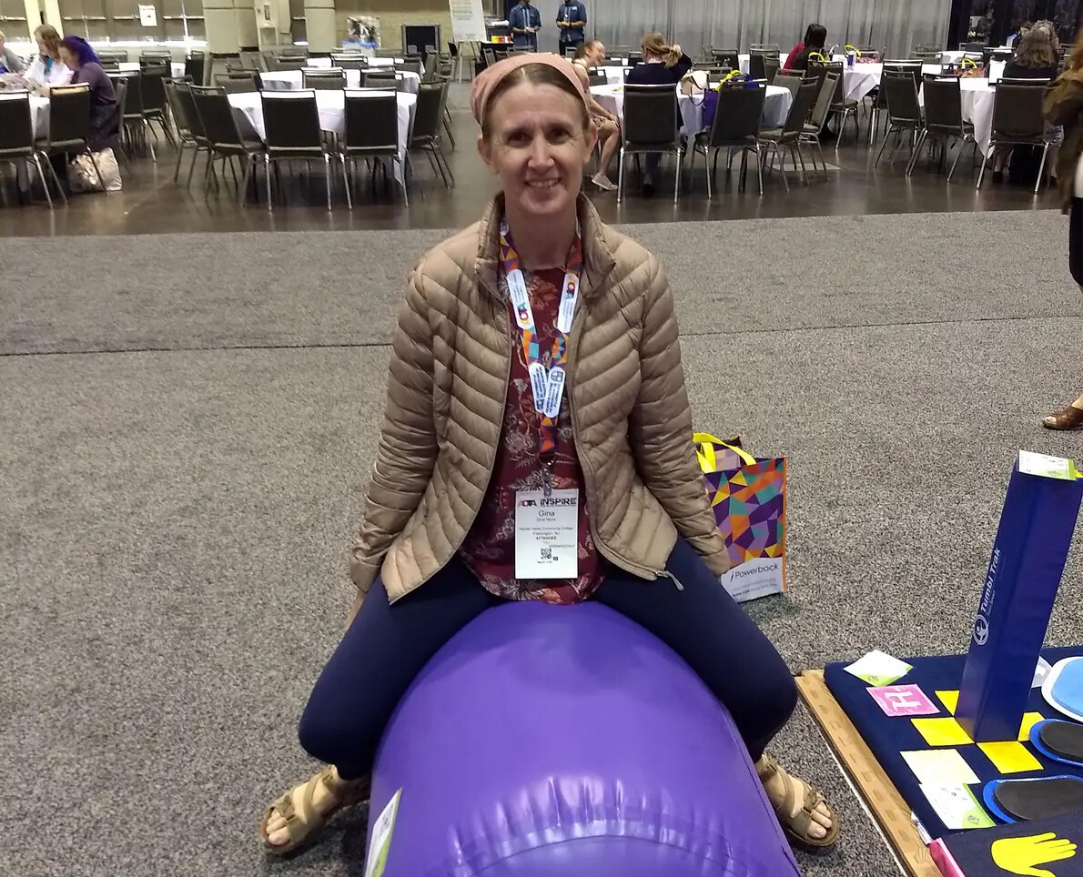 gina taylor sitting on purple inflated tube