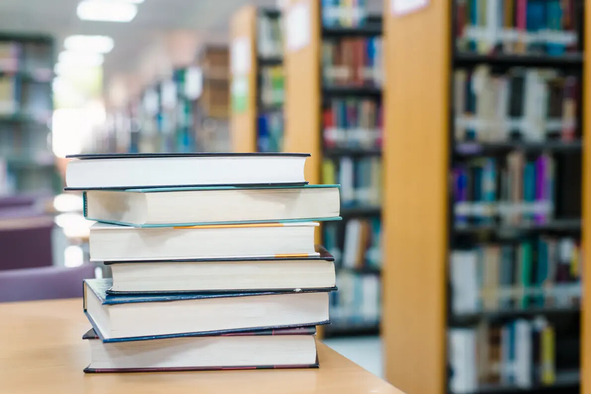 stack of books in library