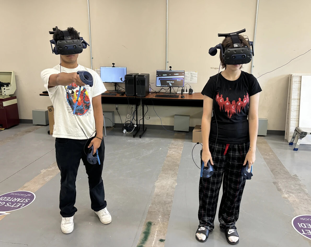 HS students wearing VR headsets