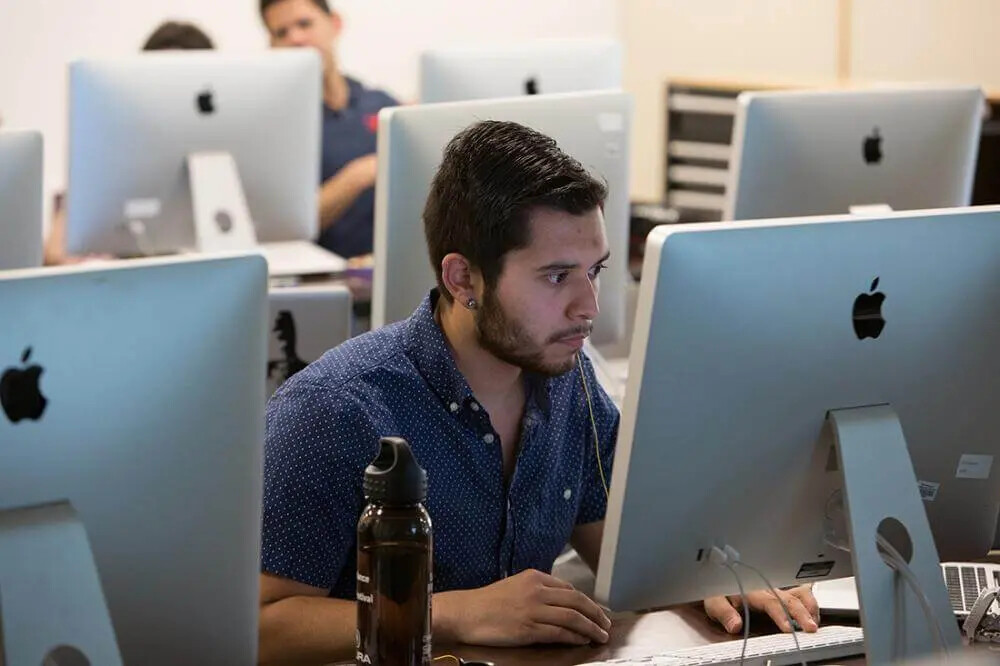 youngbearded man in computer lab 