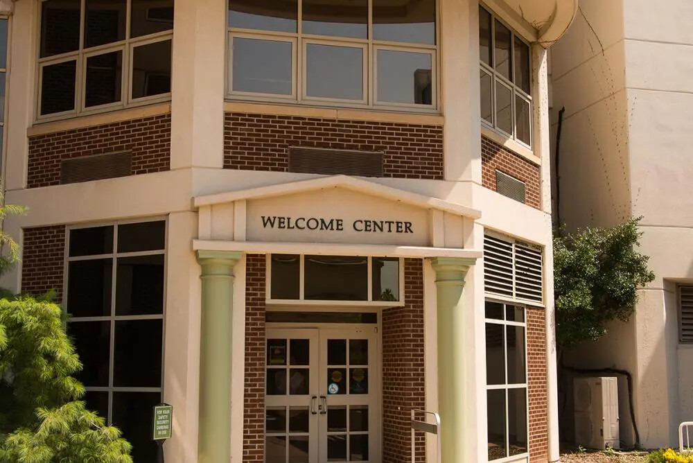 detail of welcome center sign