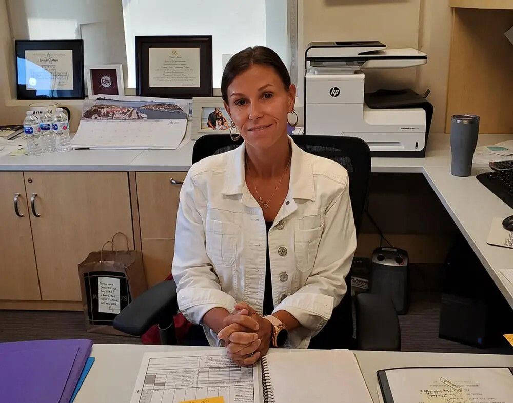 Joanie Coffaro at her desk