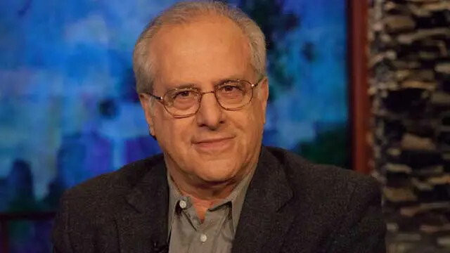 richard wolff with blue background
