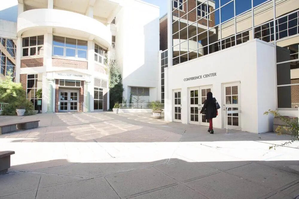 sunlit front entrance with conference center