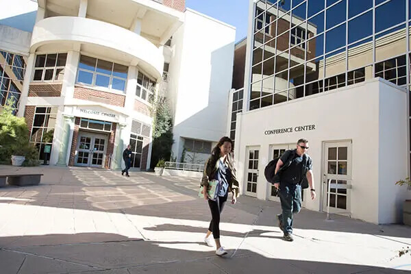 students walking at front entrance