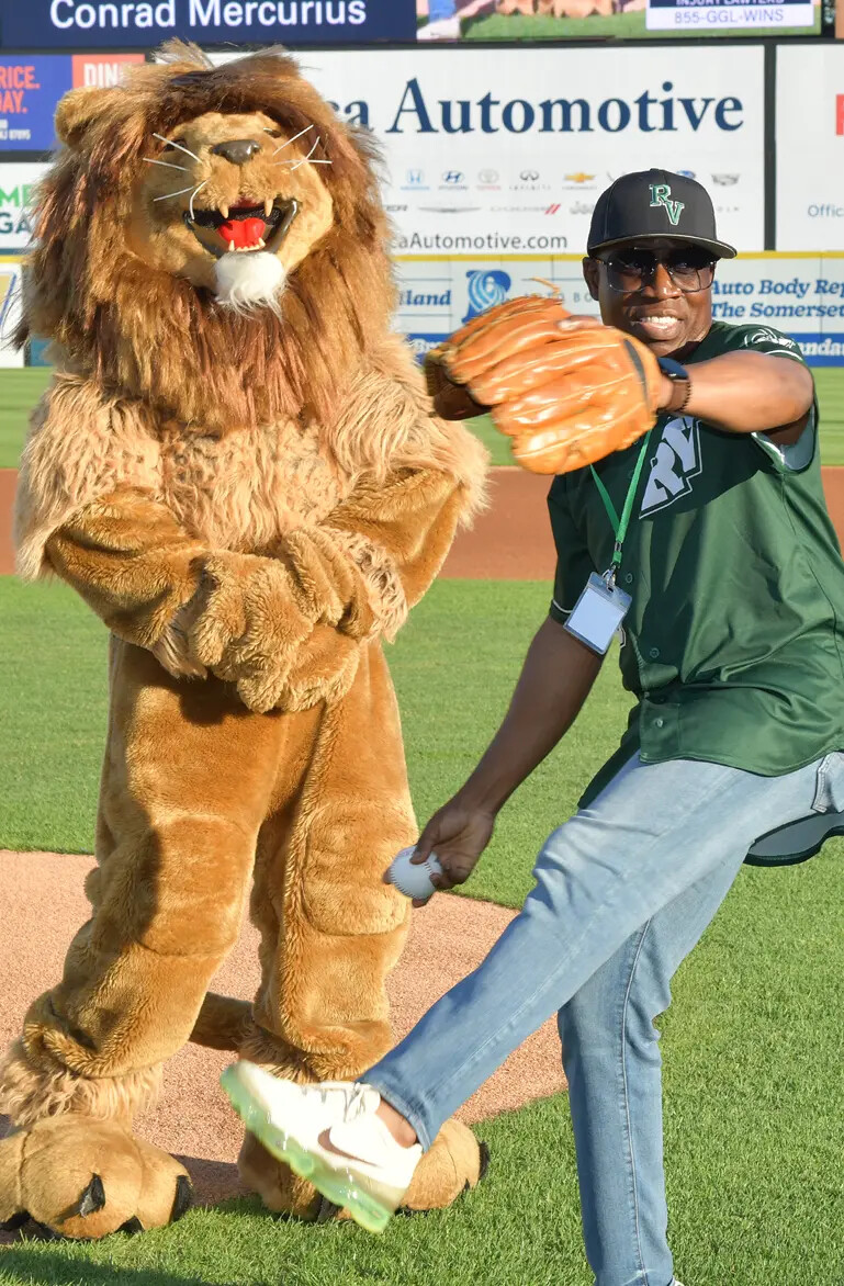 RVCC Lion Mascot and Conrad Mercurius throwing first pitch