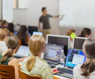 students with computers at lecture