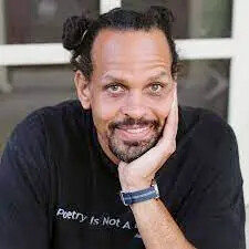 ross gay with hand on face