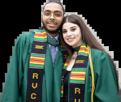 two rvcc students in graduation gowns