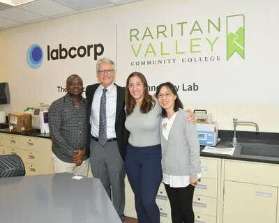 mike marion and 3 students in labcorp lab