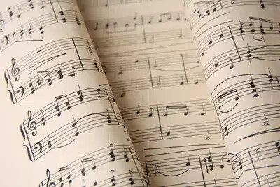 sheet music close up with bent pages