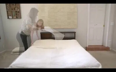 woman making bed film still