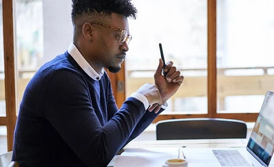 business student studying on computer