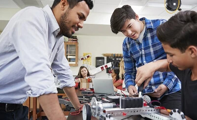 students building a machine