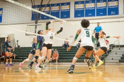 women's volleyball game with rvcc players