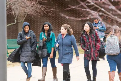 row of female students walking outside
