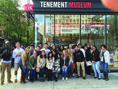 honors college students at tenement museum